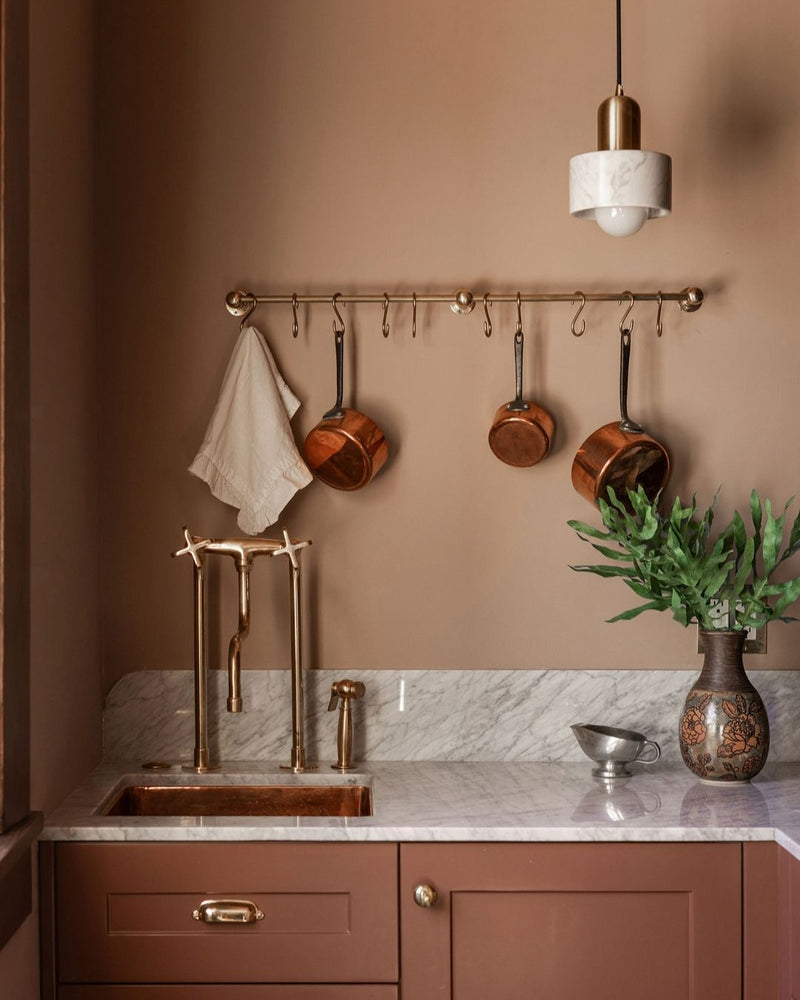 Elegant Unlacquered Brass Kitchen Faucet with Tall Legs and Unique Elephant Trunk Spout - BRASSMA