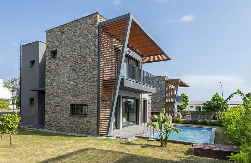 everest coffee grey manufactured stone siding 317887 garden pool tree side view of the house