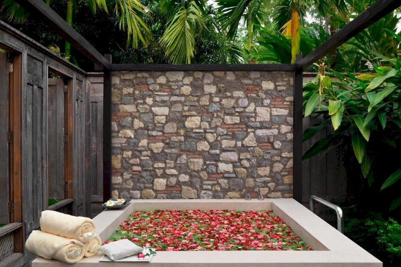 farm cream manufactured stone siding 317871 pool with flowers towels tree