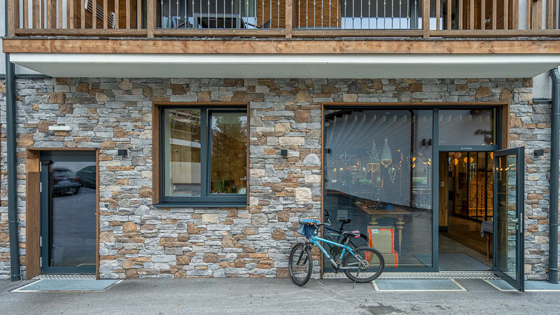 landmark grey coffee manufactured stone siding 317879 store entrance bicycle