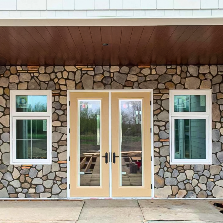 montana coffee grey manufactured stone siding 317884 store entrance