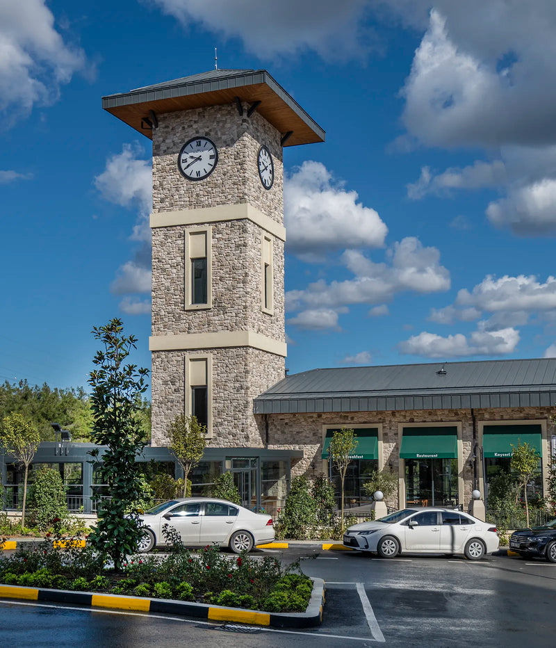 monte bello oyster white manufactured stone siding 317892 clock tower